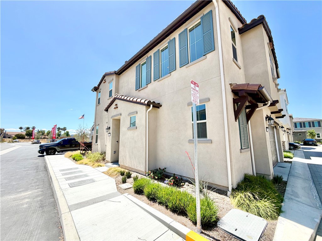 29561 Monarch Road Menifee, CA 92586 - Photo 3 of 35 a view of a house with a street