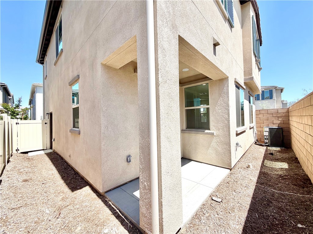 29561 Monarch Road Menifee, CA 92586 - Photo 32 of 35 a view of a house with a hallway