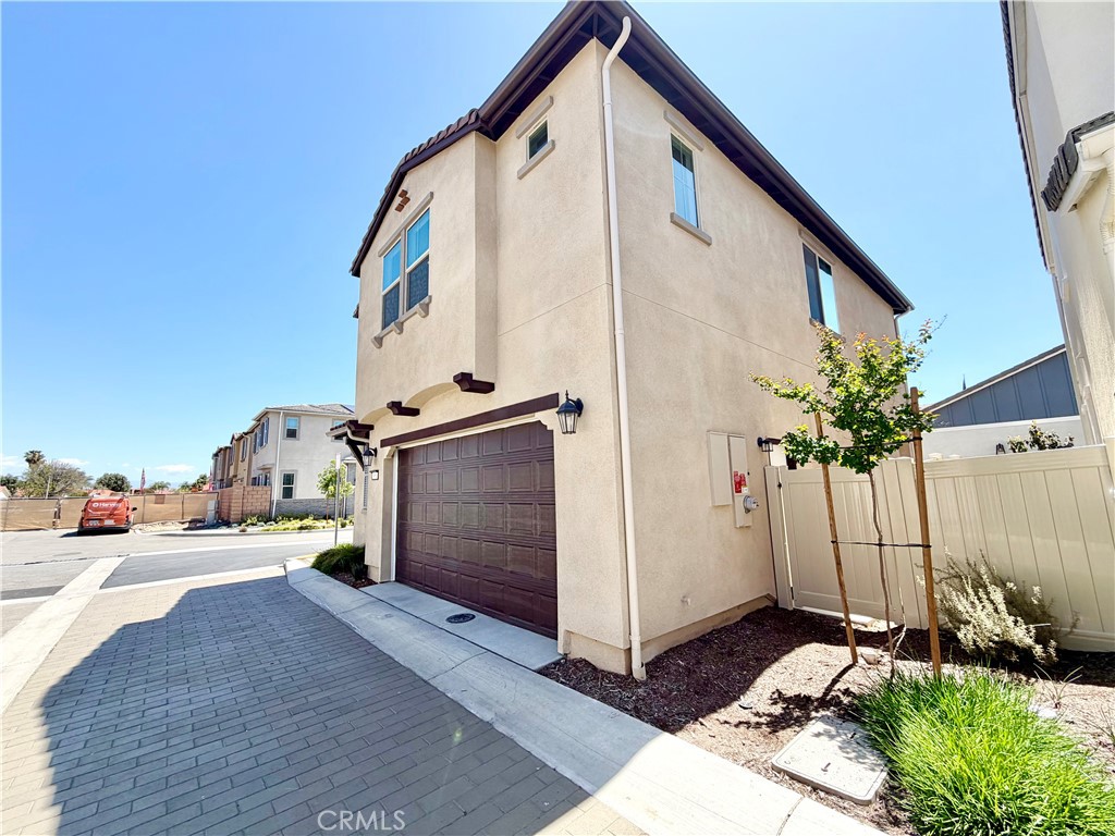 29561 Monarch Road Menifee, CA 92586 - Photo 5 of 35 a view of a house with a street