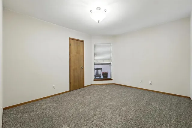 an empty room with closet