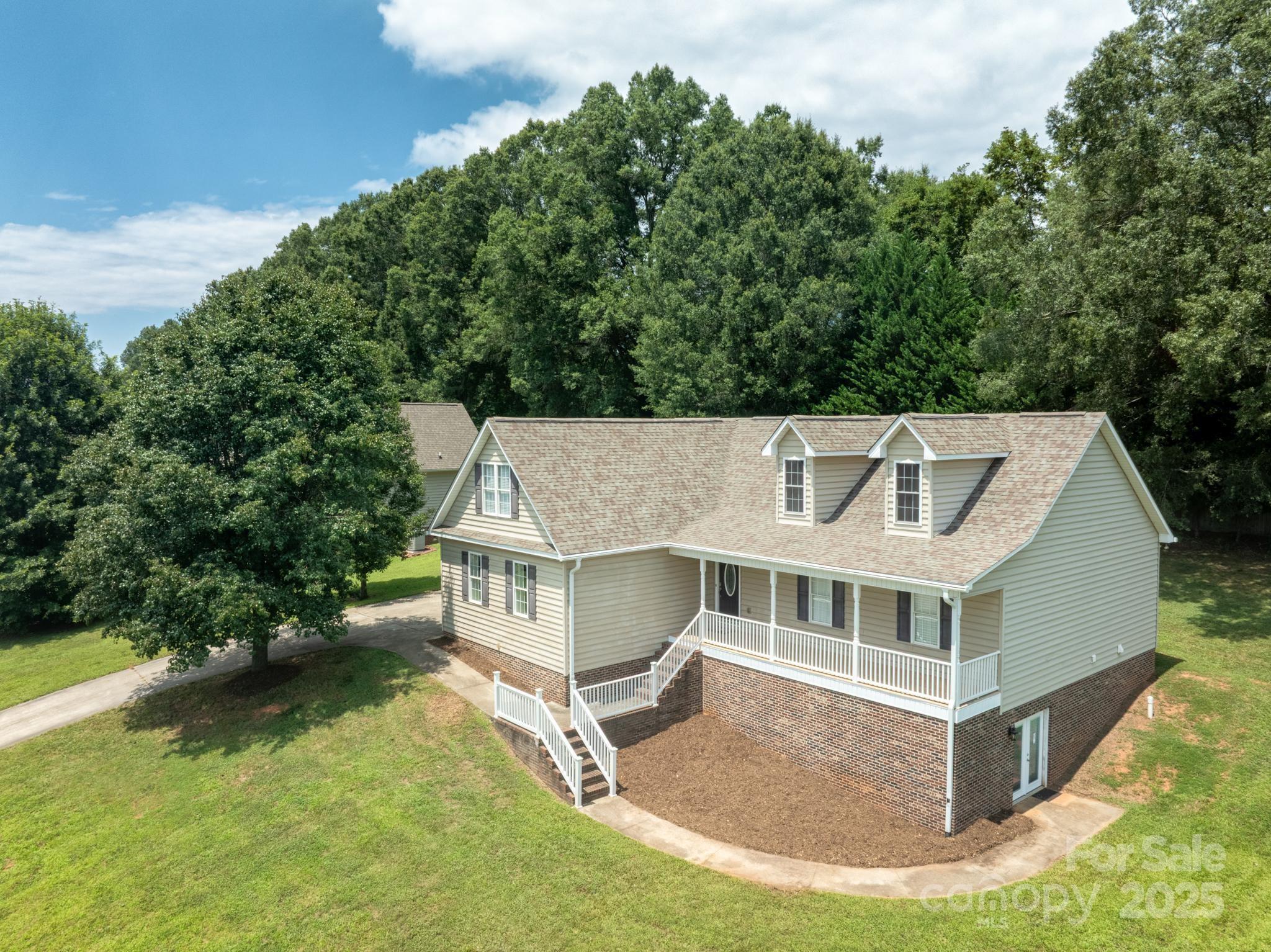 2133 Olde Farm Road Southeast Hudson, NC 28638 - Photo 2 of 42 an aerial view of a house with a yard