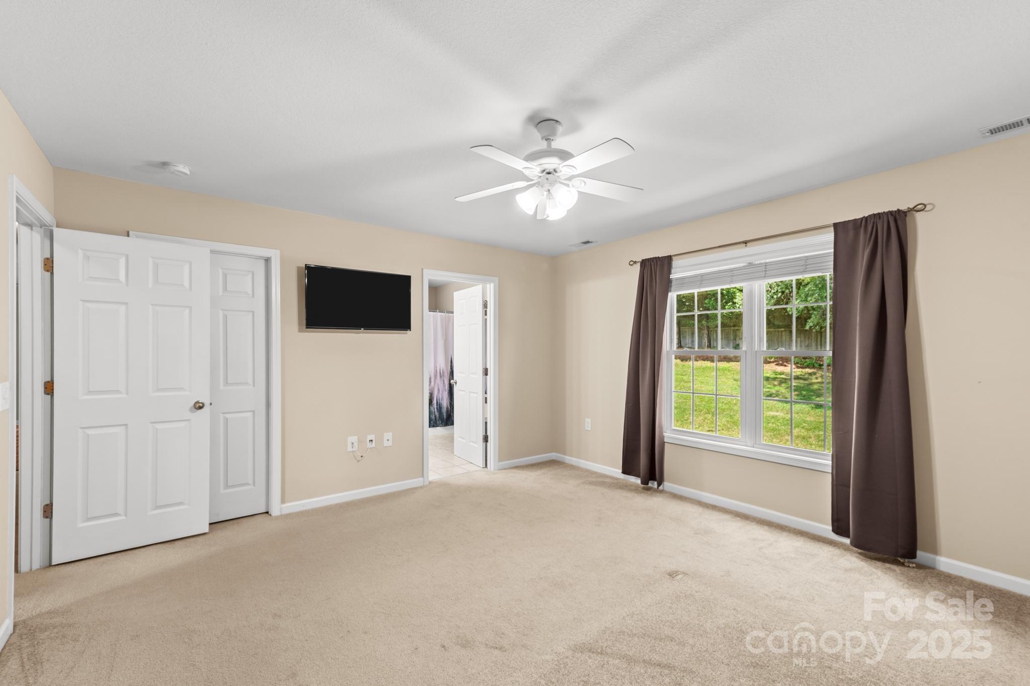 2133 Olde Farm Road Southeast Hudson, NC 28638 - Photo 22 of 42 a view of an empty room with a window