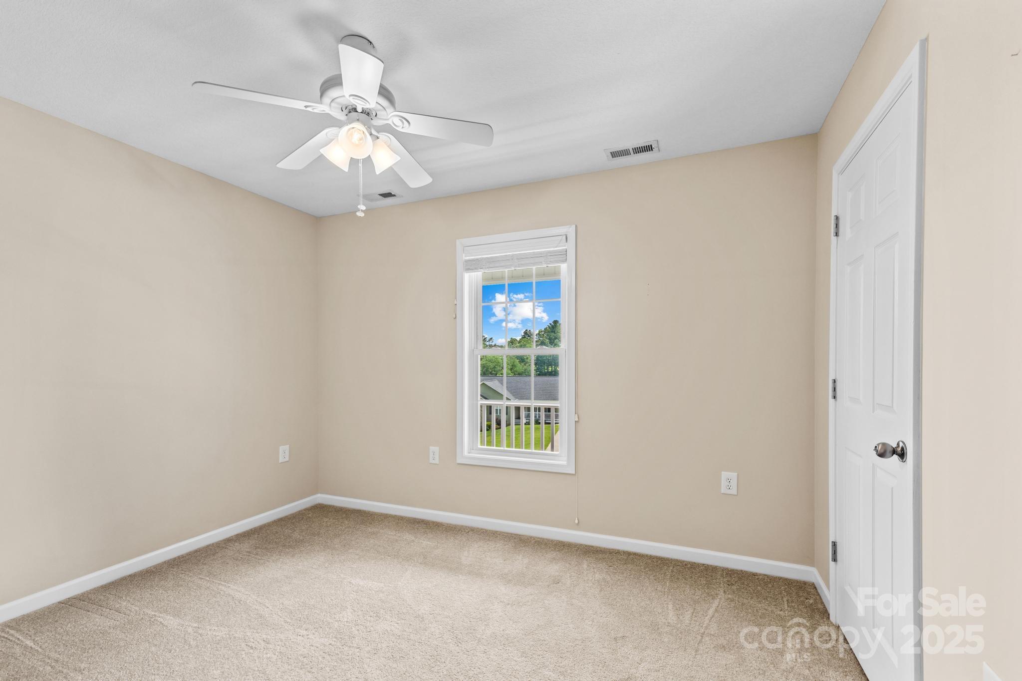 2133 Olde Farm Road Southeast Hudson, NC 28638 - Photo 25 of 42 a view of an empty room with a window