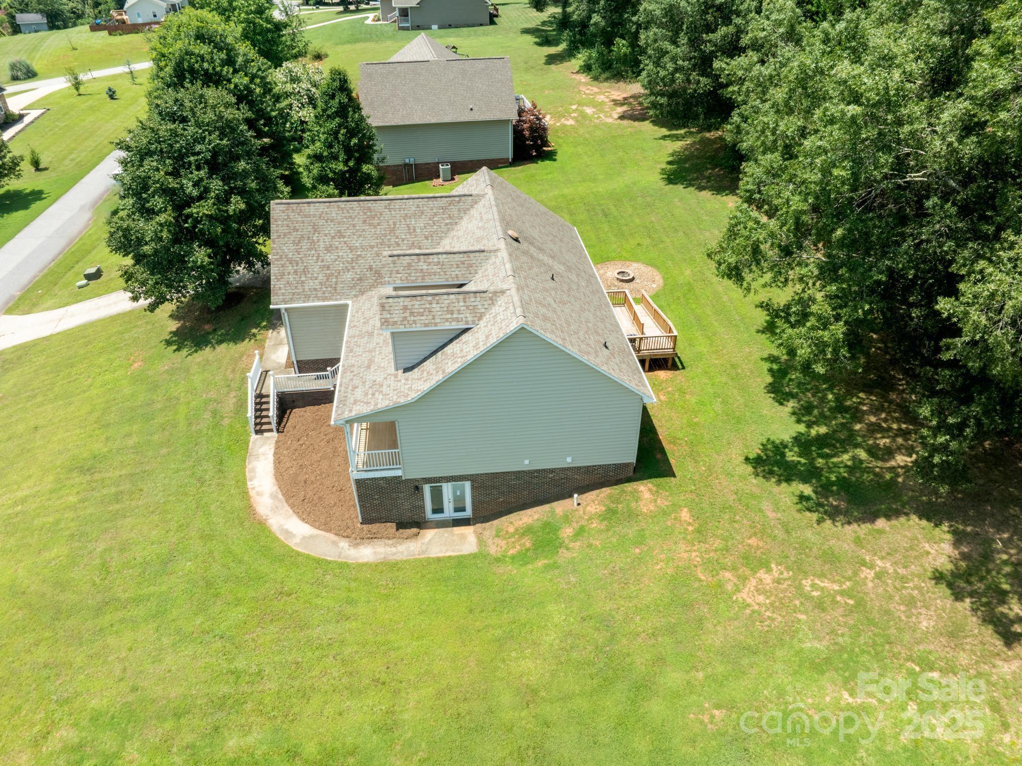 2133 Olde Farm Road Southeast Hudson, NC 28638 - Photo 34 of 42 a view of a house with a yard