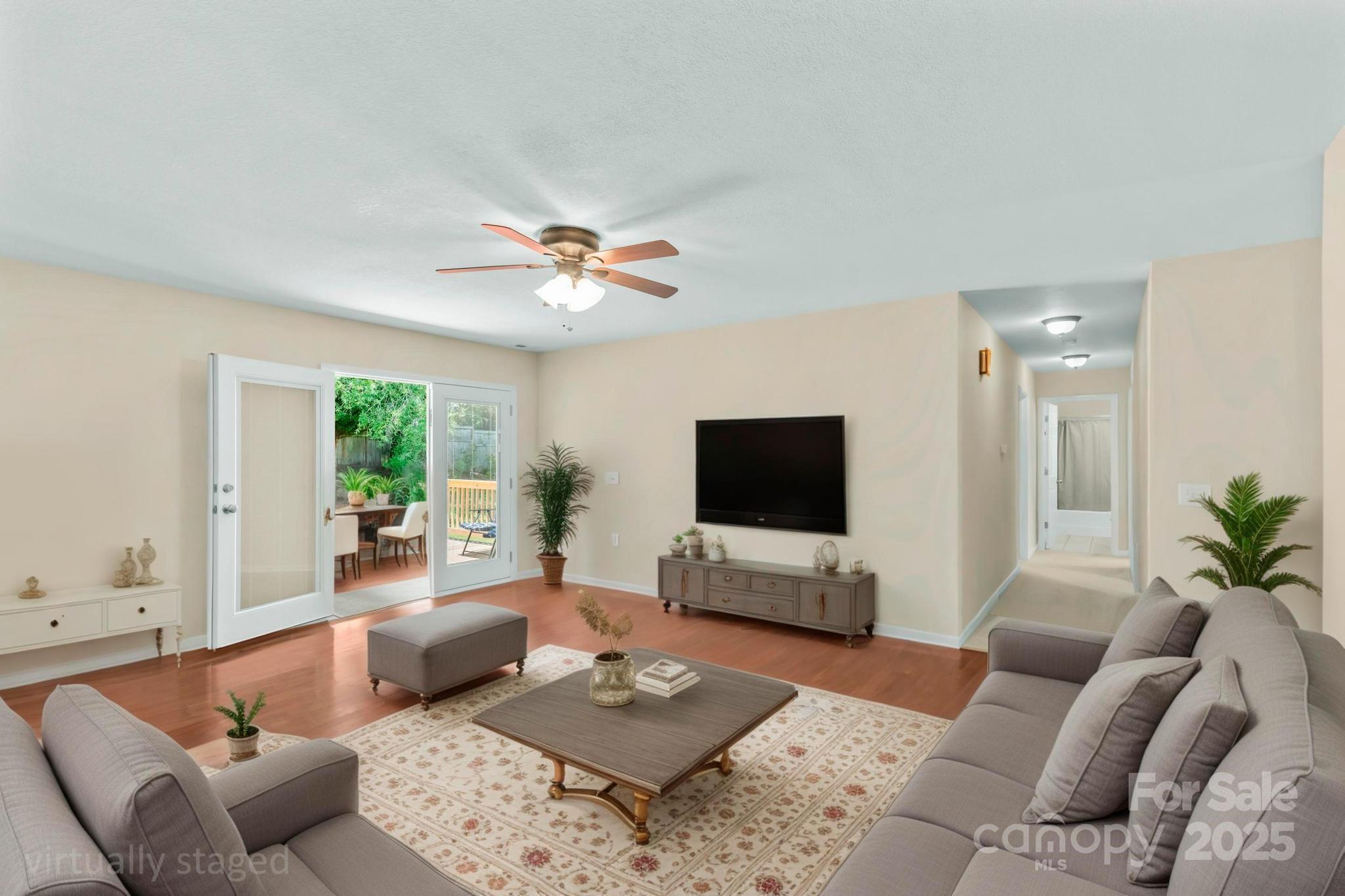 2133 Olde Farm Road Southeast Hudson, NC 28638 - Photo 8 of 42 a living room with furniture and a flat screen tv