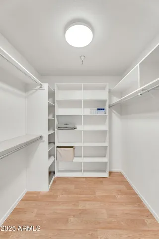 a bathroom with a shower and toilet