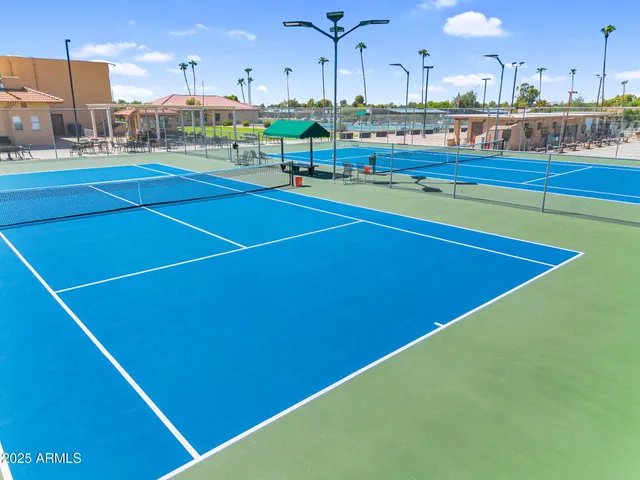 a view of a water fountain and an ocean view