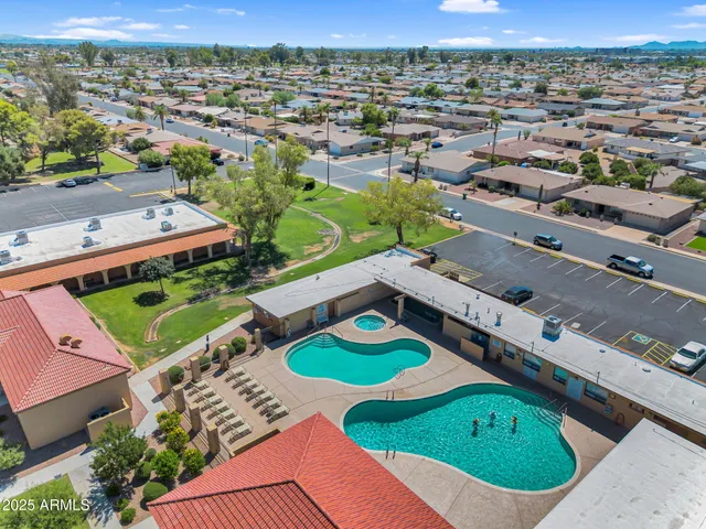an aerial view of a swimming pool