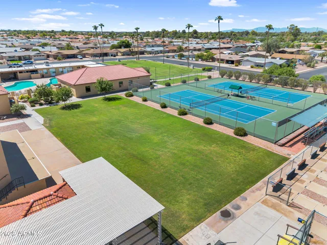 an aerial view of a house with a garden