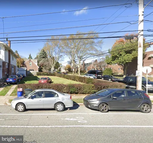 a car parked in front of a building