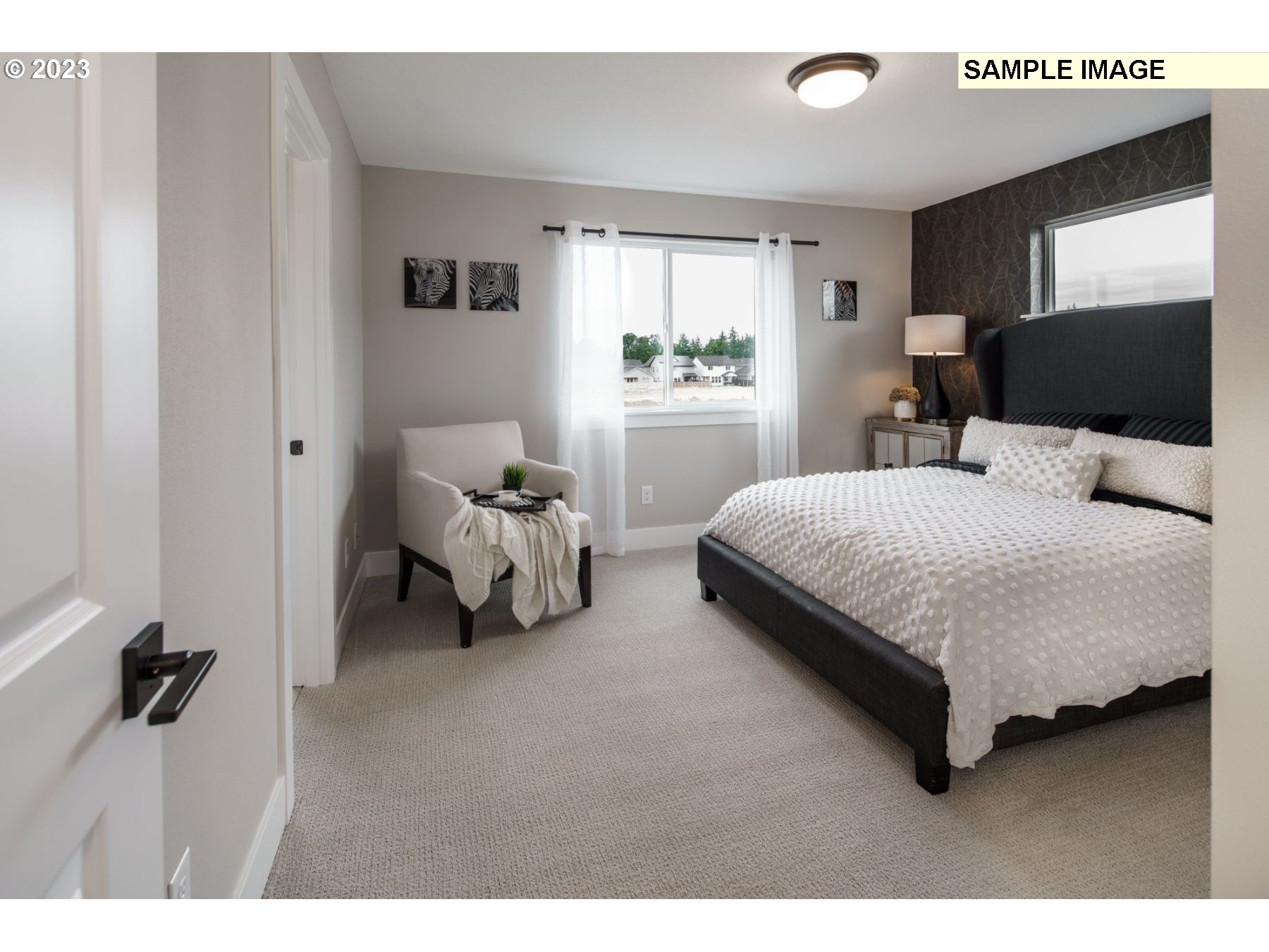 17801 Northwest 7th Avenue, Unit 76 Ridgefield, WA 98642 - Photo 13 of 20 a bedroom with bed and window
