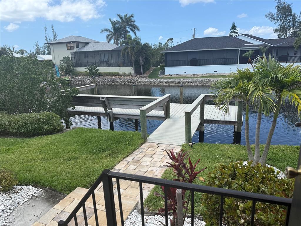 3601 Magnolia Way Punta Gorda, FL 33950 - Photo 1 of 26 a view of a chairs and table in the patio