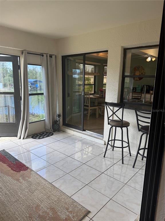 3601 Magnolia Way Punta Gorda, FL 33950 - Photo 13 of 26 a view of a livingroom with furniture and window