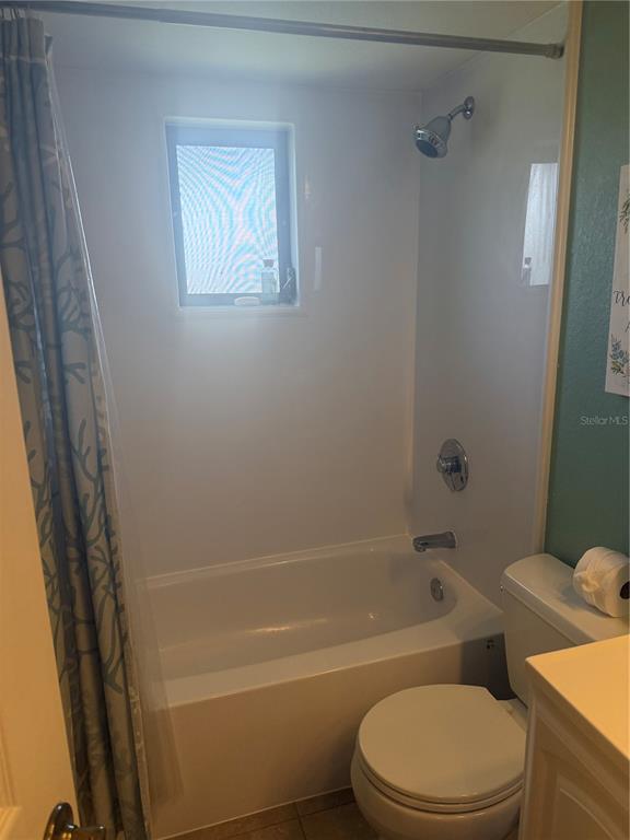 3601 Magnolia Way Punta Gorda, FL 33950 - Photo 15 of 26 a white toilet and tub sitting next to a bathroom sink