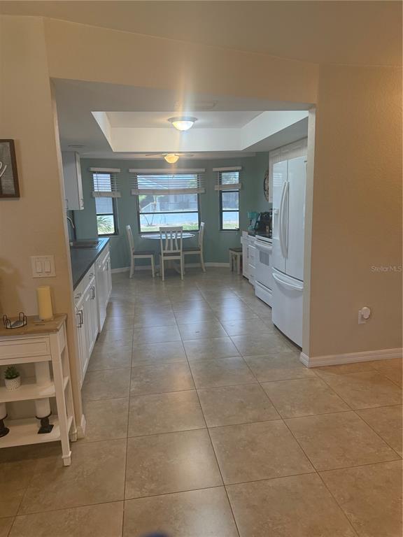 3601 Magnolia Way Punta Gorda, FL 33950 - Photo 21 of 26 a dining room with furniture and a rug
