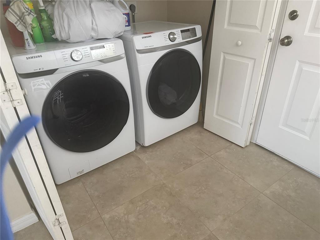 3601 Magnolia Way Punta Gorda, FL 33950 - Photo 24 of 26 a utility room with dryer and washer