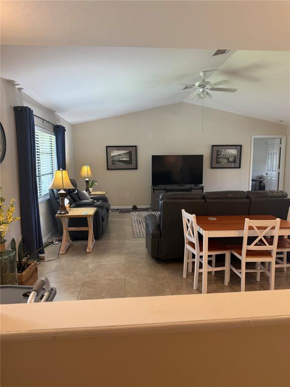 3601 Magnolia Way Punta Gorda, FL 33950 - Photo 3 of 26 a living room with furniture and a flat screen tv