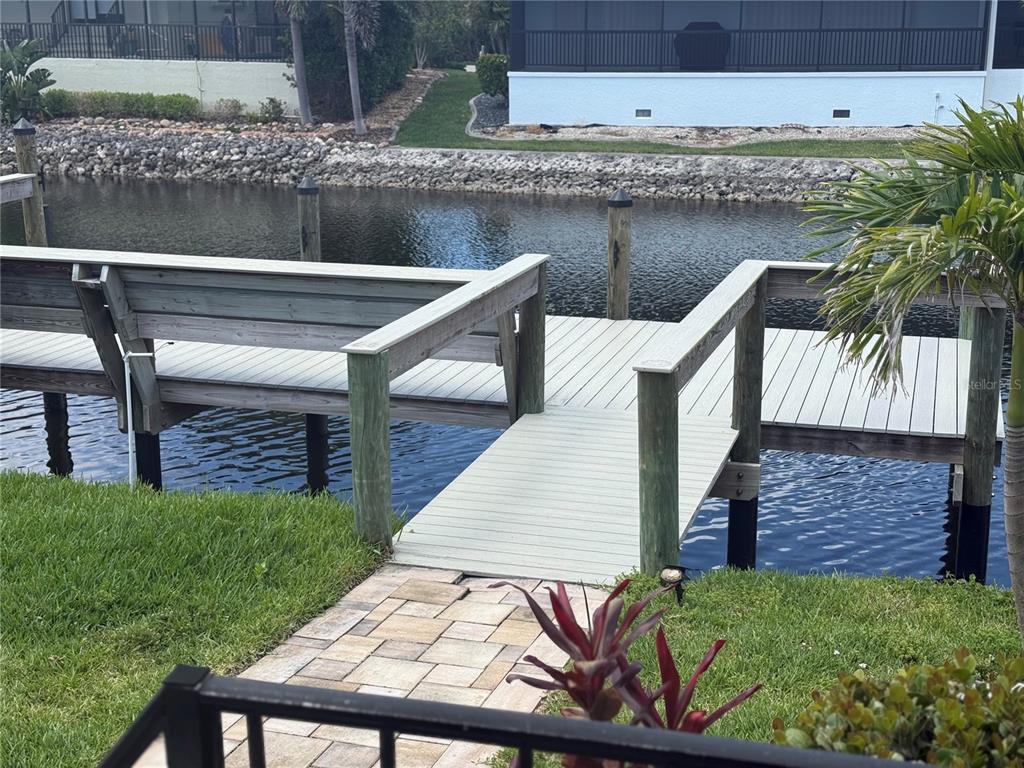 3601 Magnolia Way Punta Gorda, FL 33950 - Photo 8 of 26 a view of a backyard with plants
