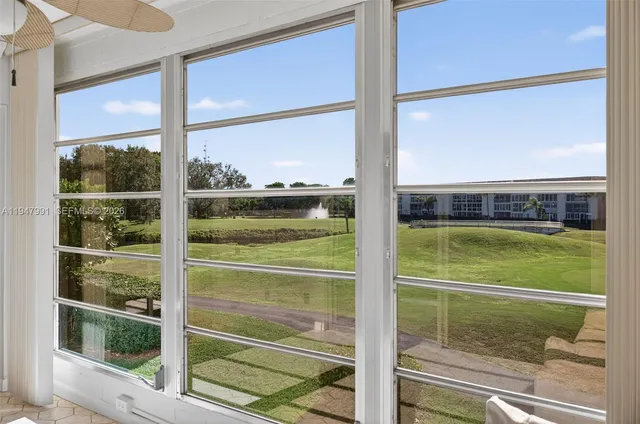 a view of swimming pool from a window