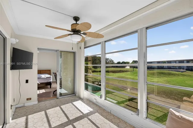a view of a livingroom with a flat screen tv