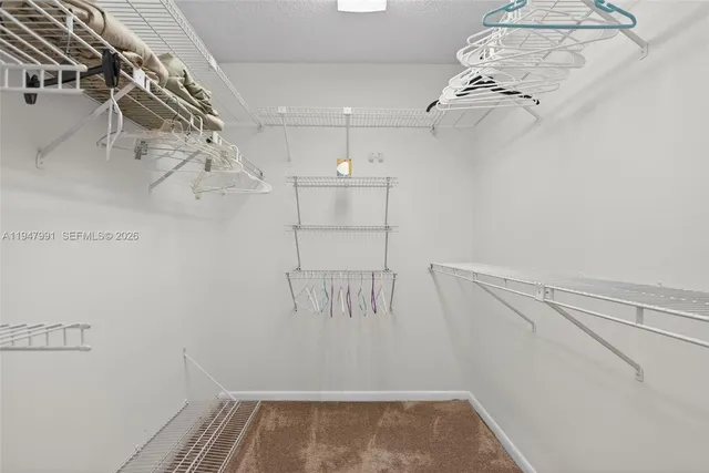 a view of a room with racks on the wall