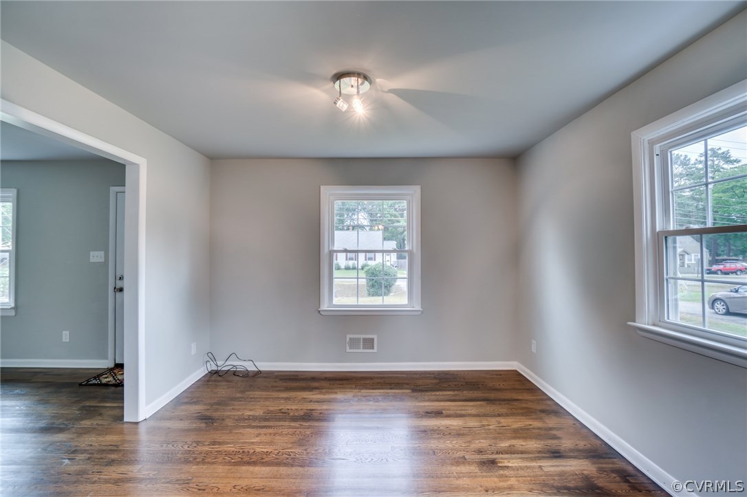 5525 Jahnke Road Richmond, VA 23225 - Photo 16 of 35 an empty room with wooden floor and windows