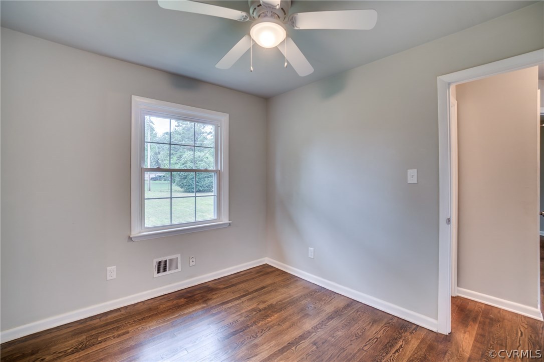 5525 Jahnke Road Richmond, VA 23225 - Photo 25 of 35 an empty room with wooden floor and windows