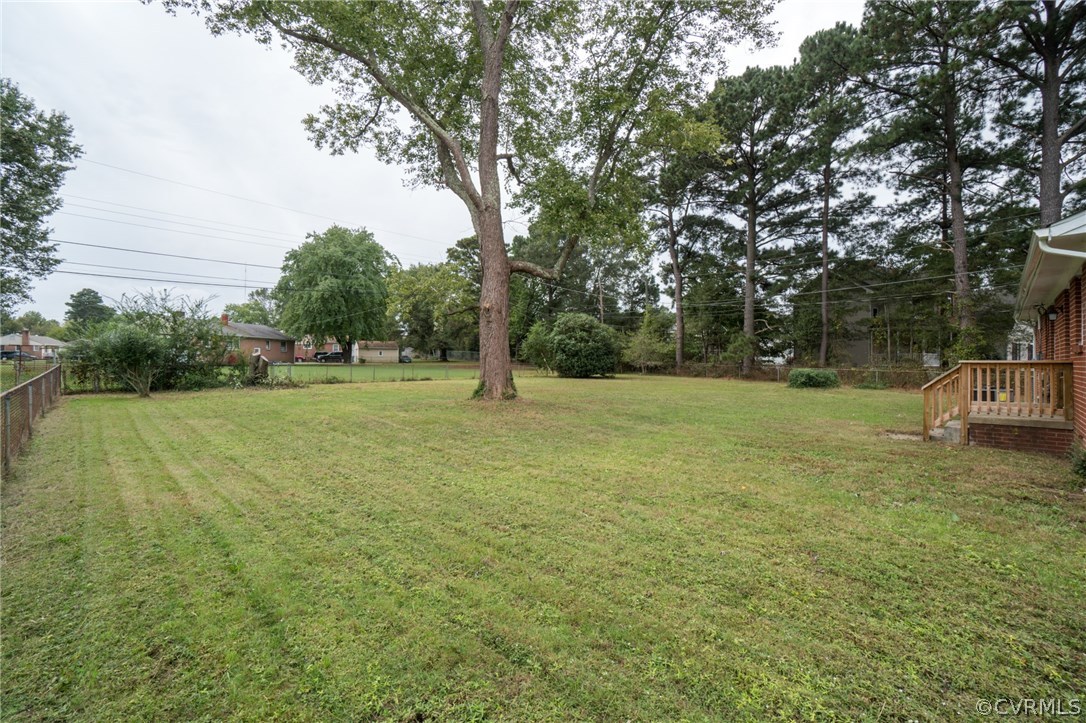 5525 Jahnke Road Richmond, VA 23225 - Photo 5 of 35 a view of field with tall trees