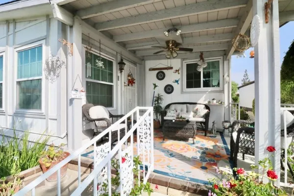 a front view of a house with patio