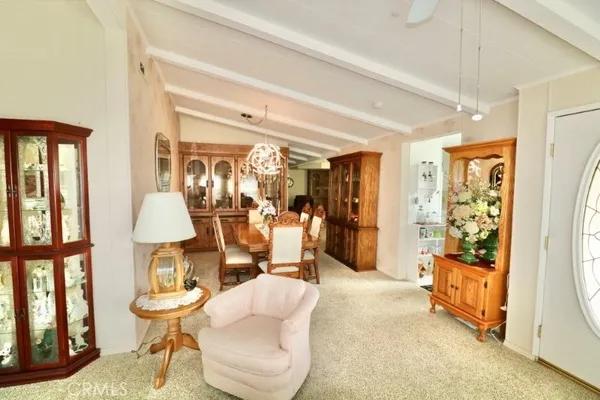a kitchen with stainless steel appliances kitchen island granite countertop a sink and cabinets