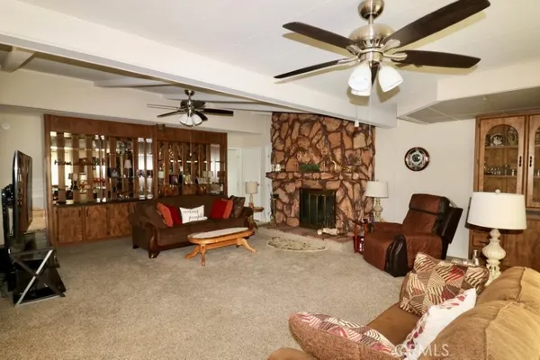 a bed room with a bed and a dresser