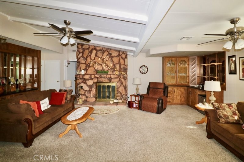 1346 Clear Lake Place, Unit 70 Brea, CA 92821 - Photo 38 of 53 a living room with furniture and a fireplace