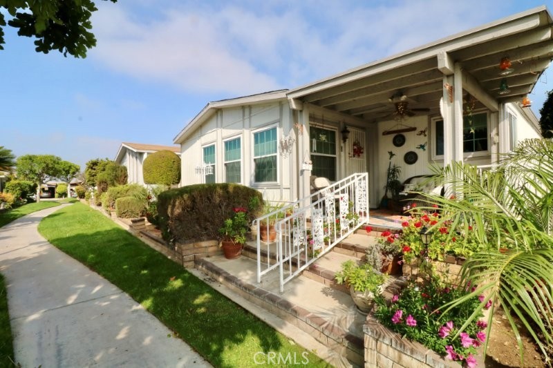 1346 Clear Lake Place, Unit 70 Brea, CA 92821 - Photo 5 of 53 front view of a house with a yard