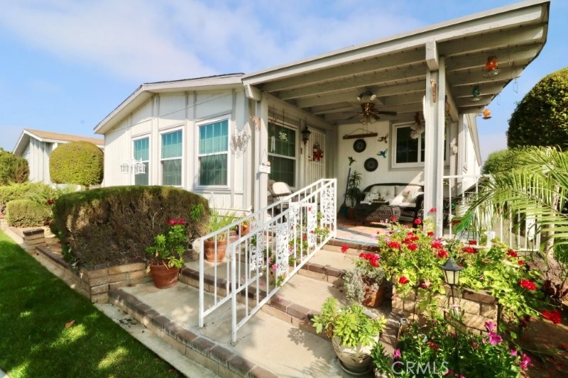 1346 Clear Lake Place, Unit 70 Brea, CA 92821 - Photo 6 of 53 a front view of a house with a porch