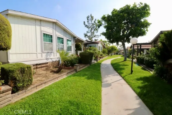 a house view with a garden space