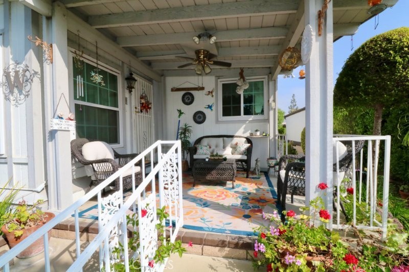 1346 Clear Lake Place, Unit 70 Brea, CA 92821 - Photo 8 of 53 a roof deck with table and chairs and potted plants