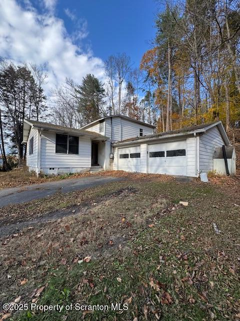 12078 Creek Road Clarks Summit, PA 18411 - Photo 2 of 20 a front view of a house with a yard
