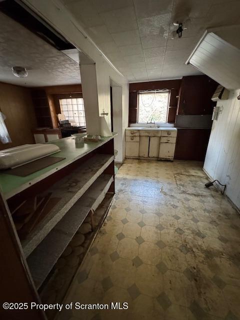 12078 Creek Road Clarks Summit, PA 18411 - Photo 7 of 20 a living room with furniture a window and a fireplace