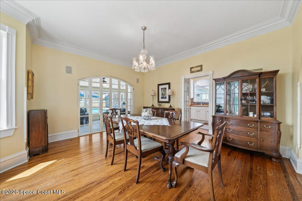 1110 Riverside Drive Titusville, FL 32780 - Photo 10 of 50 a view of a dining room with furniture window and wooden floor