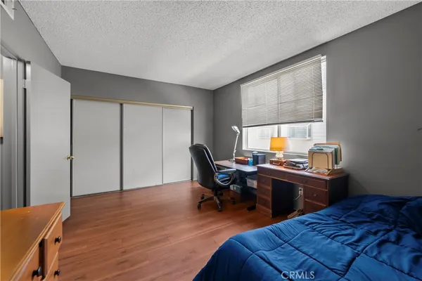 a workspace with furniture and a window