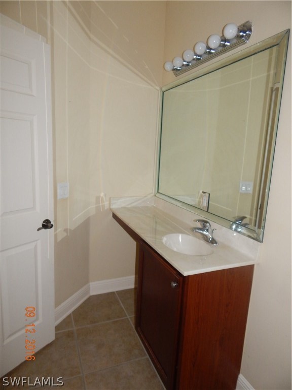 12780 River Road Fort Myers, FL 33905 - Photo 14 of 24 a bathroom with a sink and a mirror