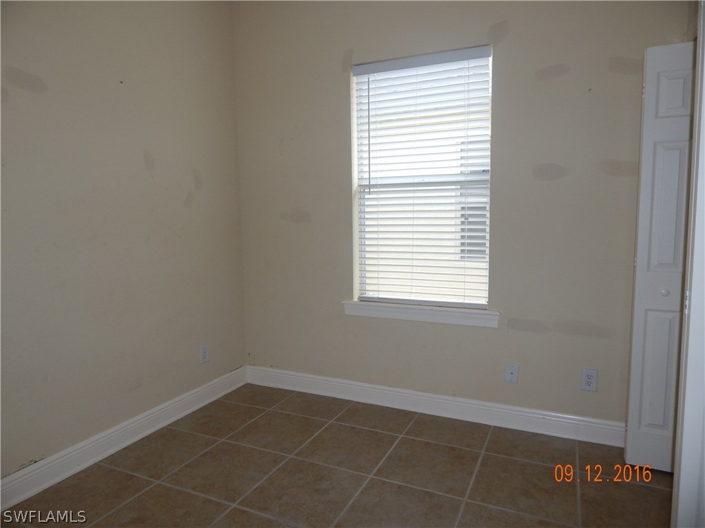 12780 River Road Fort Myers, FL 33905 - Photo 16 of 24 a view of an empty room with a window