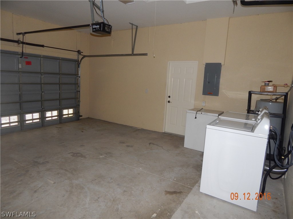 12780 River Road Fort Myers, FL 33905 - Photo 23 of 24 a view of a storage & utility room with washer and dryer