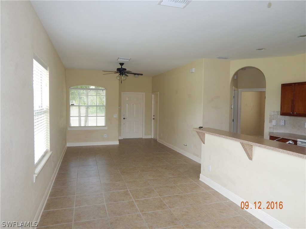 12780 River Road Fort Myers, FL 33905 - Photo 8 of 24 a view of a livingroom with furniture and a flat screen tv