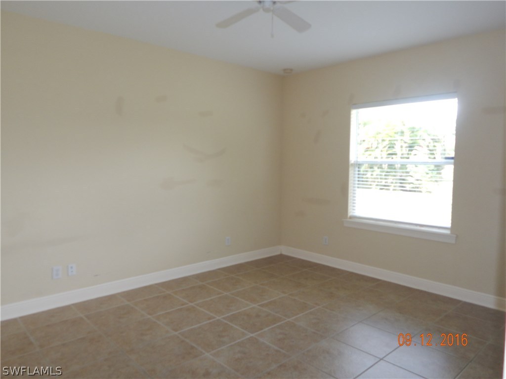 12780 River Road Fort Myers, FL 33905 - Photo 9 of 24 an empty room with a window