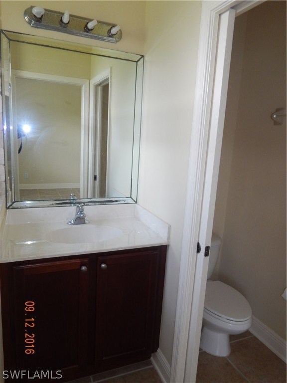 12780 River Road Fort Myers, FL 33905 - Photo 10 of 24 a bathroom with a sink and a mirror