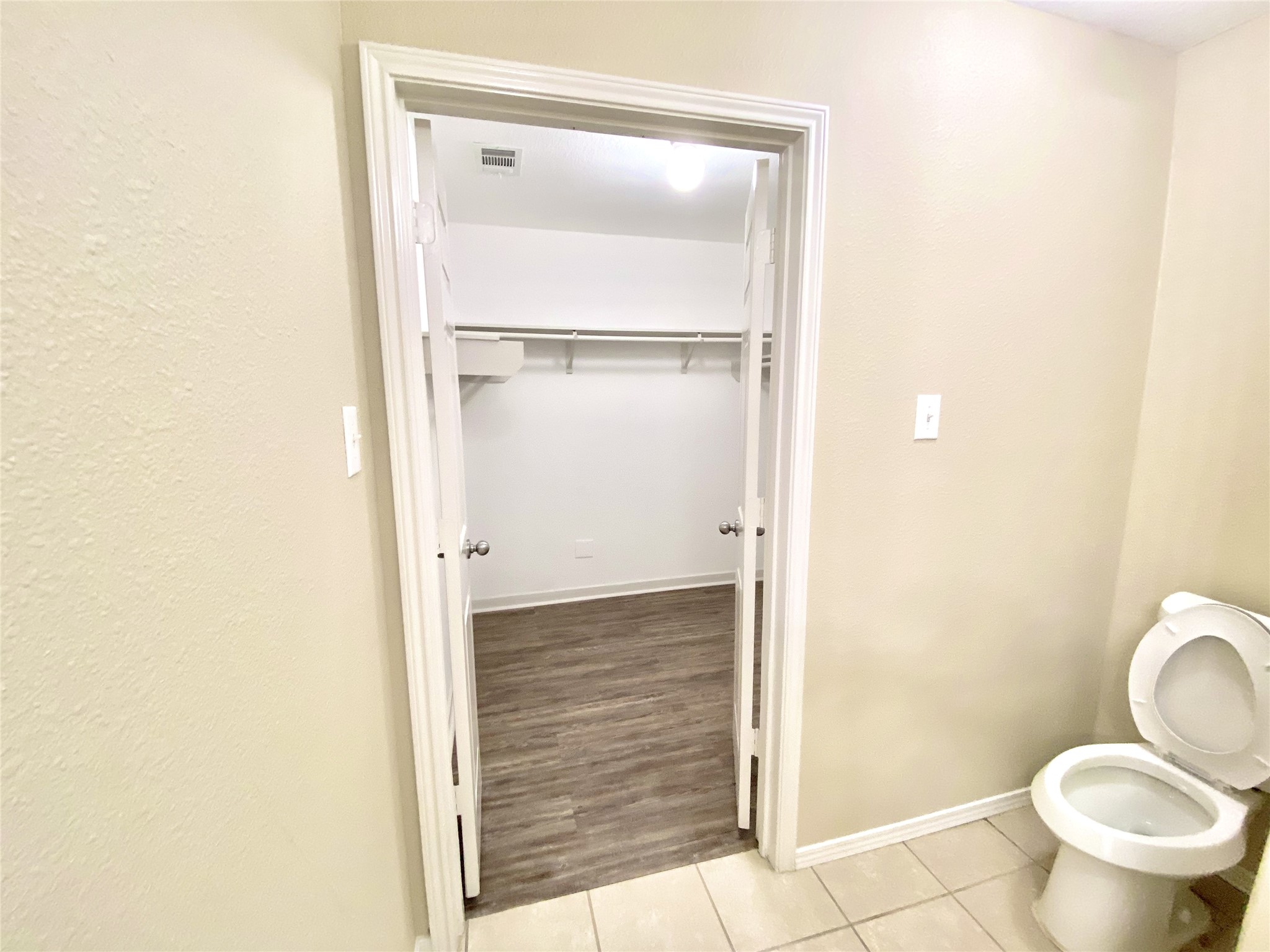 28922 San Bernard River Loop Spring, TX 77386 - Photo 11 of 31 a bathroom with a granite countertop toilet and a sink