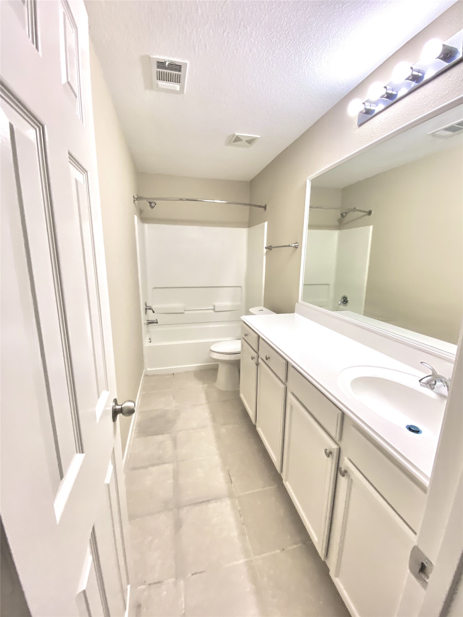 28922 San Bernard River Loop Spring, TX 77386 - Photo 14 of 31 a bathroom with a sink a mirror and a shower