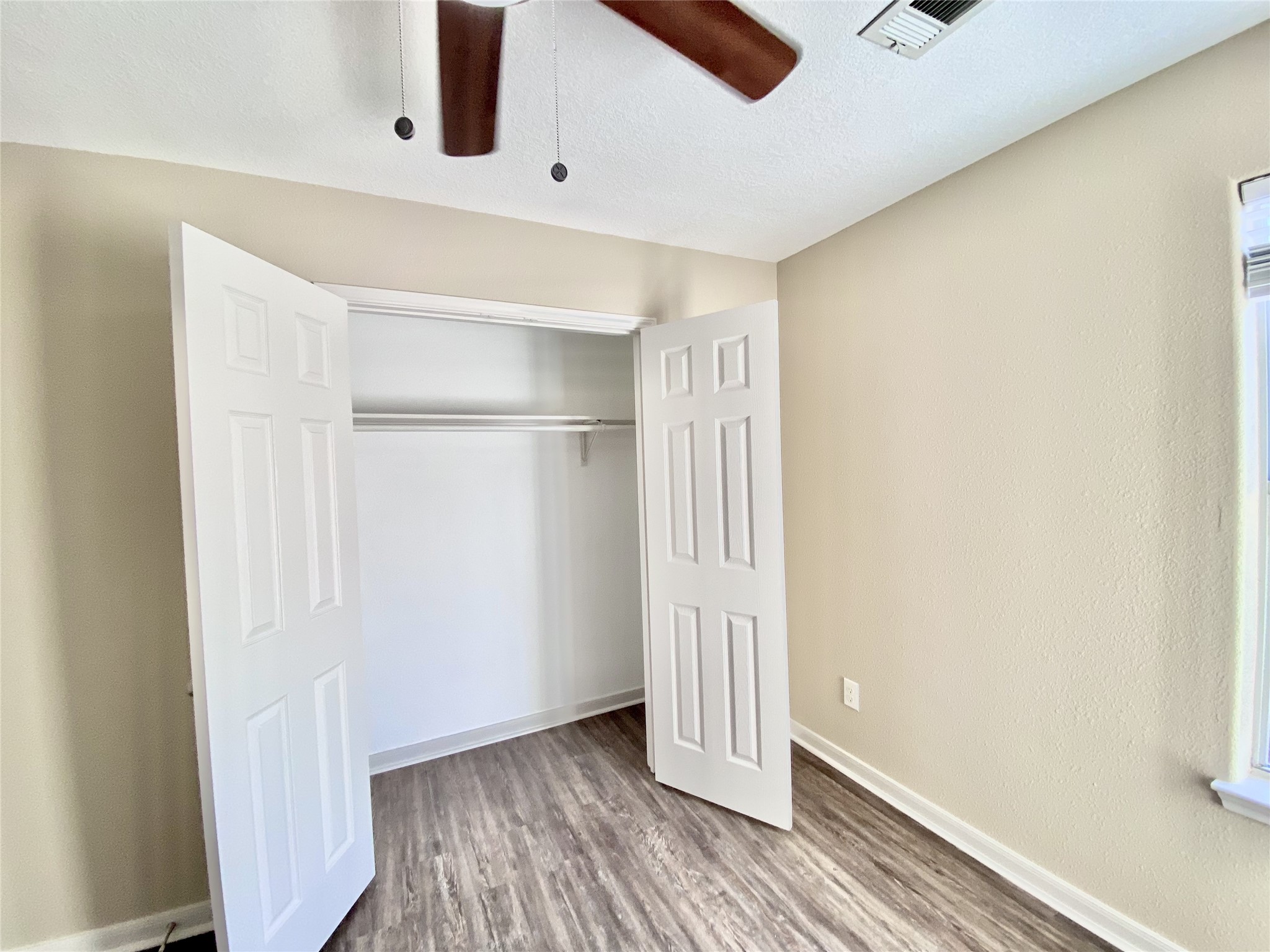28922 San Bernard River Loop Spring, TX 77386 - Photo 16 of 31 a view of front door and wooden floor