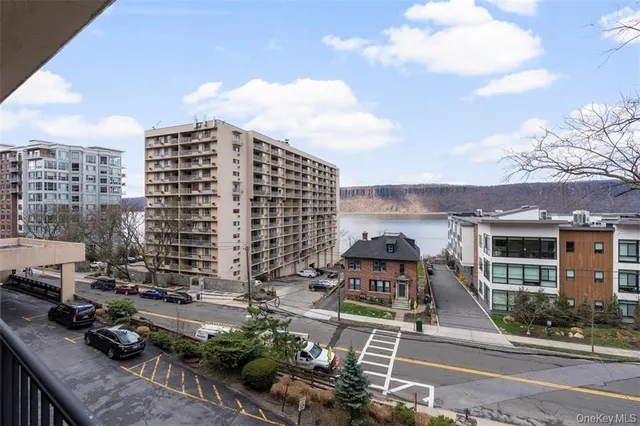 a front view of a building with street view
